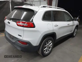 2016 Jeep Cherokee Altitude with VIN 1C4PJLCB7GW342904, listed as a IAAI auction lot 42281323 with 124,309 mi miles and . Bid and sale history available at DreamBid. Image 4.