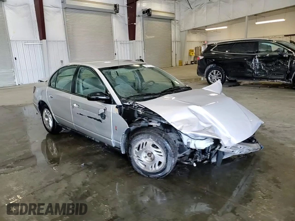 2002 Saturn SL z VIN 1G8ZK527X2Z267857, wystawiony jako Copart lot #46072975 z przebiegiem Nie podano mil oraz Szkoda całkowita • Salvage title. Historia ofert i sprzedaży dostępna na DreamBid. Obrazek 11.