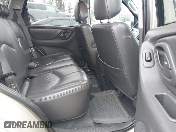 2003 Mazda Tribute ES with VIN 4F2CZ96193KM10389, listed as a IAAI auction lot 41938872 with 179,722 mi miles and . Bid and sale history available at DreamBid. Image 8.