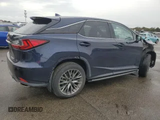 2020 Lexus RX with VIN 2T2SZMDA3LC256115, listed as a Copart auction lot 82783154 with 81,903 mi miles and Salvage Title. Bid and sale history available at carsss.com. Image 3.