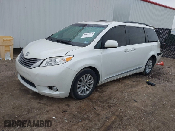 2016 Toyota Sienna XLE with VIN 5TDYK3DC2GS726677, listed as a IAAI auction lot 41609165 with 144,858 mi miles. Bid and sale history available at carsss.com. Image 2.