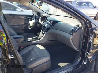 2012 Hyundai Sonata SE z VIN 5NPEC4AC6CH423122, wystawiony jako IAAI lot #41879178 z przebiegiem 64 681 mil mil oraz . Historia ofert i sprzedaży dostępna na DreamBid. Obrazek 5.