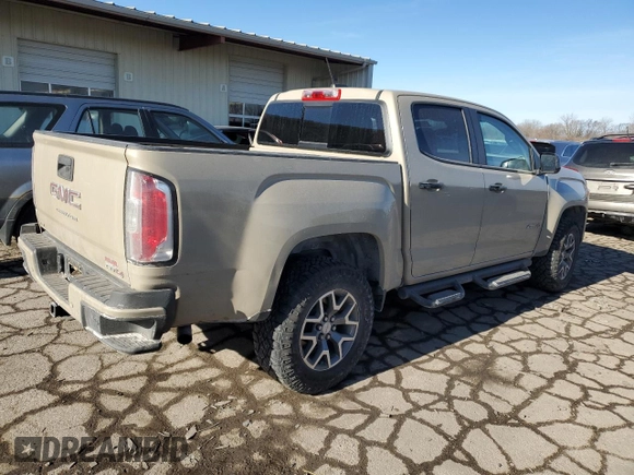 2022 GMC Canyon 4WD AT4 w/Leather with VIN 1GTG6FEN2N1157017, listed as a Copart auction lot 42788605 with 32,317 mi miles and Salvage Title. Bid and sale history available at carsss.com. Image 3.