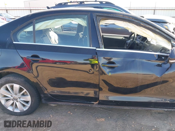 2015 Volkswagen Jetta SE z VIN 3VWD07AJ3FM266598, wystawiony jako IAAI lot #41757080 z przebiegiem 127 815 mil mil oraz . Historia ofert i sprzedaży dostępna na DreamBid. Obrazek 14.