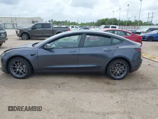 2023 Tesla Model 3 z VIN 5YJ3E1EA1PF642955, wystawiony jako IAAI lot #42121508 z przebiegiem 22 831 mil mil oraz . Historia ofert i sprzedaży dostępna na DreamBid. Obrazek 13.