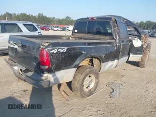 2002 Ford F-250 XL with VIN 1FTNW21F22EC74115, listed as a IAAI auction lot 41526161 with 308,639 mi miles and . Bid and sale history available at DreamBid. Image 4.