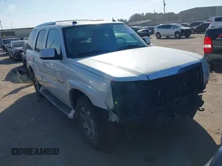 2005 Cadillac Escalade z VIN 1GYEC63TX5R114526, wystawiony jako IAAI lot #41685638 z przebiegiem 167 048 mil mil oraz . Historia ofert i sprzedaży dostępna na DreamBid. Obrazek 1.