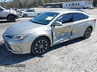 2018 Toyota Avalon XLE with VIN 4T1BK1EB9JU283488, listed as a IAAI auction lot 41777239 with 97,893 mi miles and . Bid and sale history available at DreamBid. Image 2.