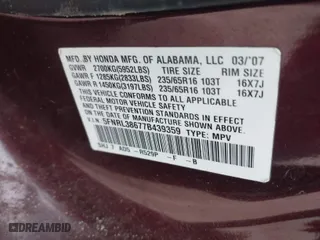 2007 Honda Odyssey EX-L with VIN 5FNRL38677B439359, listed as a IAAI auction lot 42014504 with 175,114 mi miles. Bid and sale history available at carsss.com. Image 9.
