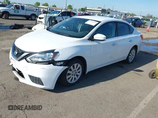 2018 Nissan Sentra S with VIN 3N1AB7AP0JY210675, listed as a IAAI auction lot 42128528 with 76,299 mi miles and . Bid and sale history available at DreamBid. Image 2.