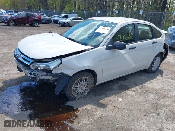 2011 Ford Focus SE with VIN 1FAHP3FN2BW100531, listed as a IAAI auction lot 42006640 with 63,563 mi miles and . Bid and sale history available at DreamBid. Image 17.
