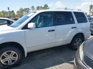 2004 Honda Pilot EX with VIN 2HKYF18564H571427, listed as a IAAI auction lot 41867906 with 359,577 mi miles. Bid and sale history available at carsss.com. Image 14.