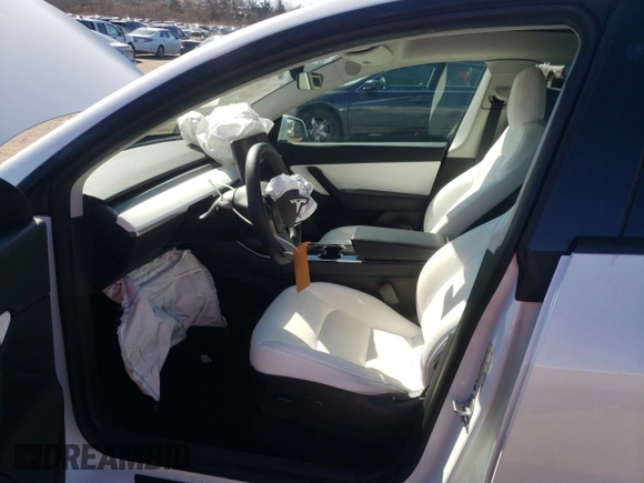 2021 Tesla Model Y Long Range with VIN 5YJYGDEE5MF118045, listed as a Copart auction lot 50790065 with 43,704 mi miles and Salvage Title. Bid and sale history available at DreamBid. Image 7.