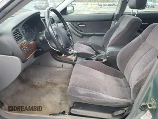 2003 Subaru Legacy L with VIN 4S3BH635437307310, listed as a Copart auction lot 86441624 with 136,189 mi miles and Salvage title. Bid and sale history available at DreamBid. Image 7.