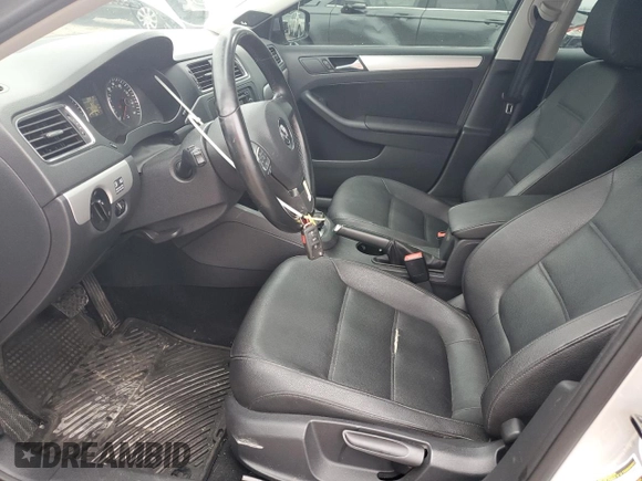 2012 Volkswagen Jetta TDI w/Premium & Nav z VIN 3VWLL7AJ8CM365576, wystawiony jako Copart lot #56728245 z przebiegiem 102 088 mil mil oraz Szkoda całkowita • Salvage title. Historia ofert i sprzedaży dostępna na DreamBid. Obrazek 7.