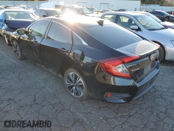 2017 Honda Civic EX-T with VIN 19XFC1E3XHE006935, listed as a Copart auction lot 70423094 with Not Provided miles and Salvage Title. Bid and sale history available at DreamBid. Image 2.