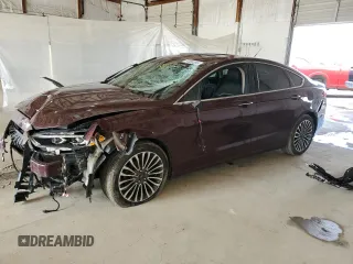 2017 Ford Fusion SE z VIN 3FA6P0H97HR135194, wystawiony jako Copart lot #50300355 z przebiegiem 129 665 mil mil oraz Szkoda całkowita • Salvage title. Historia ofert i sprzedaży dostępna na DreamBid. Obrazek 1.
