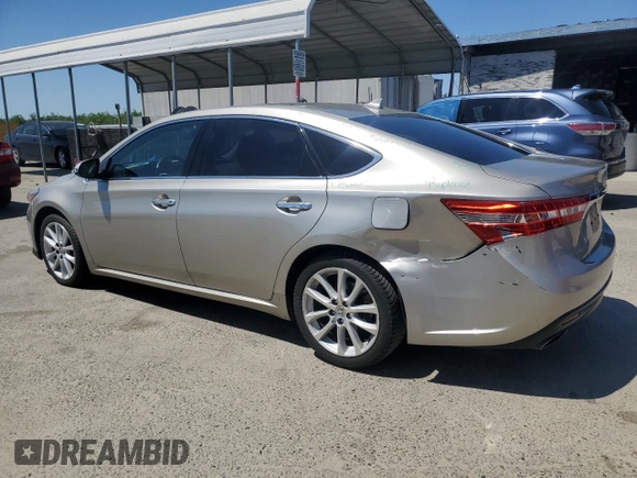 2015 Toyota Avalon Limited with VIN 4T1BK1EB4FU168949, listed as a Copart auction lot 56072295 with 203,687 mi miles and Salvage Title. Bid and sale history available at DreamBid. Image 2.