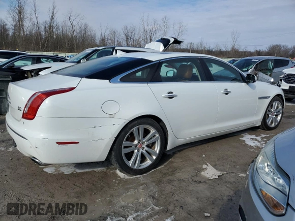 2015 Jaguar XJ Portfolio z VIN SAJWJ2GD5F8V77355, wystawiony jako Copart lot #47214835 z przebiegiem 73 202 mil mil oraz Szkoda całkowita • Salvage title. Historia ofert i sprzedaży dostępna na DreamBid. Obrazek 3.