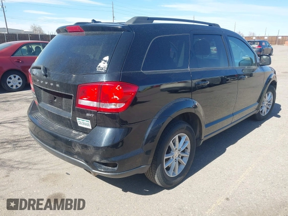 2016 Dodge Journey SXT with VIN 3C4PDDBG3GT215910, listed as a IAAI auction lot 41798779 with 165,505 mi miles. Bid and sale history available at carsss.com. Image 4.