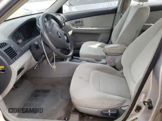 2006 Kia Spectra EX z VIN KNAFE121565370909, wystawiony jako Copart lot #56572995 z przebiegiem 102 978 mil mil oraz Szkoda całkowita • Salvage title. Historia ofert i sprzedaży dostępna na DreamBid. Obrazek 7.