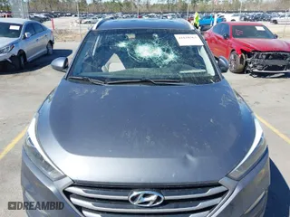 2018 Hyundai Tucson SEL with VIN KM8J3CA48JU718402, listed as a IAAI auction lot 41810363 with 218,853 mi miles. Bid and sale history available at carsss.com. Image 6.