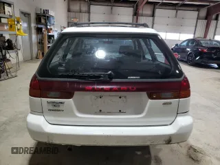 1998 Subaru Legacy L with VIN 4S3BK4352W7315173, listed as a Copart auction lot 45974945 with 87,909 mi miles and Salvage title. Bid and sale history available at DreamBid. Image 6.