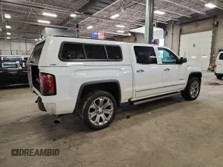 2018 GMC Sierra 1500 Denali z VIN 3GTU2PEJ2JG587157, wystawiony jako Copart lot #58516315 z przebiegiem 88 855 mil mil oraz Szkoda całkowita • Salvage title. Historia ofert i sprzedaży dostępna na DreamBid. Obrazek 3.