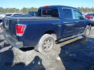 2011 Nissan Titan SL with VIN 1N6AA0EC0BN323844, listed as a IAAI auction lot 41768462 with 106,732 mi miles. Bid and sale history available at carsss.com. Image 4.