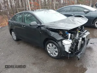 2023 Kia Rio LX z VIN 3KPA24AD9PE629927, wystawiony jako IAAI lot #41847338 z przebiegiem 5 233 mil mil oraz . Historia ofert i sprzedaży dostępna na DreamBid. Obrazek 1.