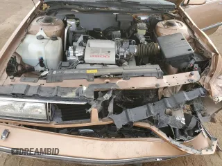 1989 Oldsmobile Delta z VIN 1G3HN54C2KW373577, wystawiony jako Copart lot #41532245 z przebiegiem 78 364 mil mil oraz Tytuł czysty. Historia ofert i sprzedaży dostępna na DreamBid. Obrazek 11.