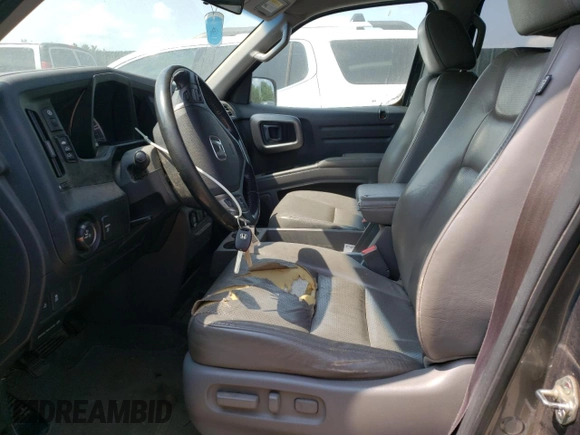 2012 Honda Ridgeline RTL z VIN 5FPYK1F59CB001005, wystawiony jako Copart lot #59713305 z przebiegiem 204 963 mil mil oraz Szkoda całkowita • Salvage title. Historia ofert i sprzedaży dostępna na DreamBid. Obrazek 7.