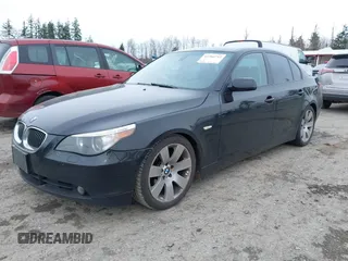 2007 BMW 5 Series 530i with VIN WBANE735X7CM46704, listed as a IAAI auction lot 41766712 with 172,163 mi miles. Bid and sale history available at carsss.com. Image 2.