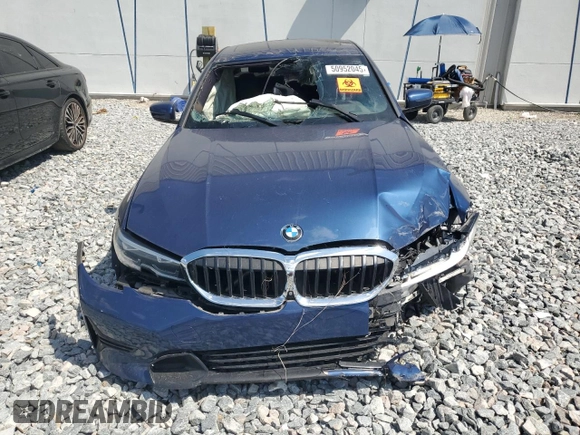 2021 BMW 3 Series 330i with VIN 3MW5R1J06M8B56990, listed as a Copart auction lot 50952045 with 0 mi miles and Clean Title. Bid and sale history available at carsss.com. Image 5.