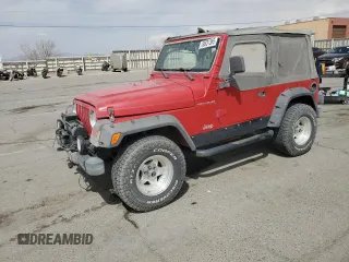 1999 Jeep Wrangler SE with VIN 1J4FY29P8XP407347, listed as a Copart auction lot 50831365 with 243,942 mi miles and Salvage title. Bid and sale history available at DreamBid. Image 1.