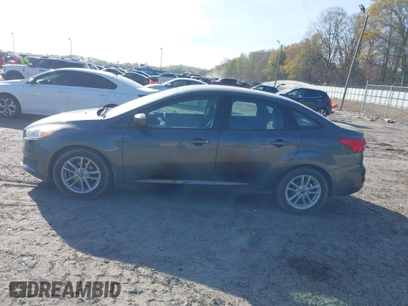 2018 Ford Focus SE with VIN 1FADP3F27JL294865, listed as a IAAI auction lot 41897496 with 100,048 mi miles and . Bid and sale history available at carsss.com. Image 15.