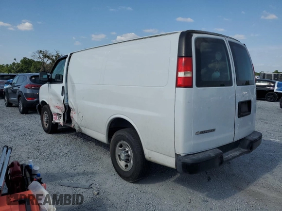 2017 Chevrolet Express Cargo with VIN 1GCWGAFF4H1352771, listed as a Copart auction lot 54472305 with 106,950 mi miles and Salvage title. Bid and sale history available at DreamBid. Image 2.