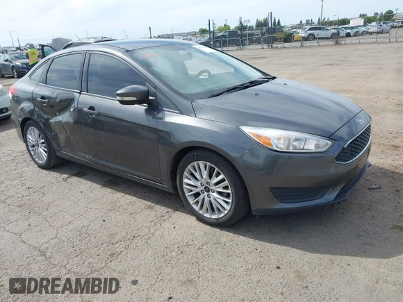 2018 Ford Focus SE z VIN 1FADP3F20JL327186, wystawiony jako IAAI lot #42271070 z przebiegiem 131 511 mil mil oraz . Historia ofert i sprzedaży dostępna na DreamBid. Obrazek 1.