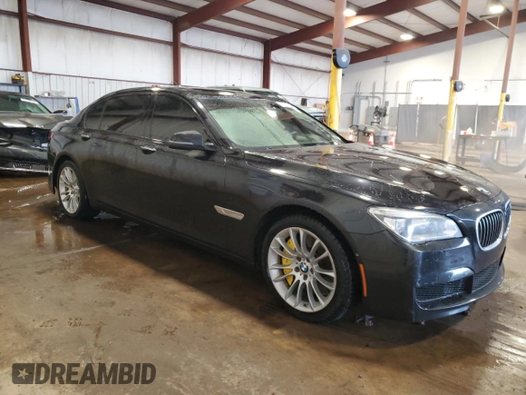 2014 BMW 7 Series ALPINA B7 xDrive with VIN WBAYF8C53ED652566, listed as a Copart auction lot 61177235 with 144,566 mi miles and Salvage title. Bid and sale history available at DreamBid. Image 4.