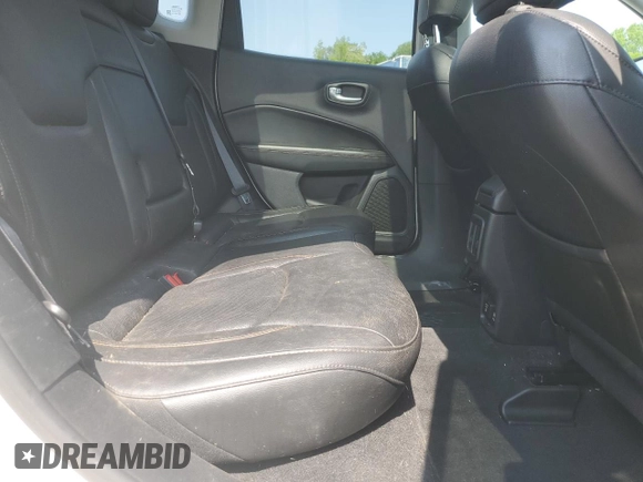 2018 Jeep Compass Limited z VIN 3C4NJDCB6JT206659, wystawiony jako Copart lot #58779315 z przebiegiem Nie podano mil oraz Szkoda całkowita • Salvage title. Historia ofert i sprzedaży dostępna na DreamBid. Obrazek 11.