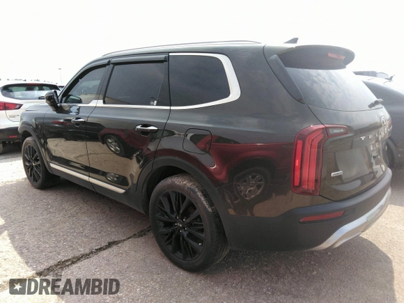 2020 Kia Telluride SX with VIN 5XYP5DHC7LG003935, listed as a IAAI auction lot 32399947 with 82,256 mi miles and . Bid and sale history available at DreamBid. Image 3.