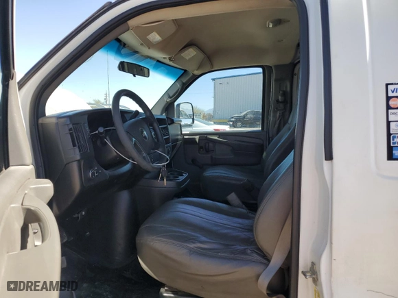 2009 Chevrolet Express Cargo Van with VIN 1GCGG25C191115299, listed as a Copart auction lot 46713485 with 248,217 mi miles and Salvage Title. Bid and sale history available at carsss.com. Image 7.