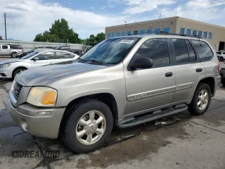 2002 GMC Envoy SLT z VIN 1GKDT13S622289652, wystawiony jako Copart lot #59690045 z przebiegiem 240 666 mil mil oraz Szkoda całkowita • Salvage title. Historia ofert i sprzedaży dostępna na DreamBid. Obrazek 1.