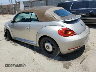 2014 Volkswagen Beetle 1.8T with VIN 3VW517AT9EM820812, listed as a Copart auction lot 61730685 with 85,571 mi miles and Clean title. Bid and sale history available at DreamBid. Image 2.