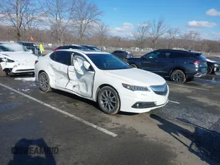 2015 Acura TLX V6 Tech with VIN 19UUB3F58FA002616, listed as a IAAI auction lot 41540955 with 91,956 mi miles. Bid and sale history available at carsss.com. Image 1.