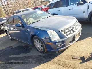 2009 Cadillac STS AWD w/1SB with VIN 1G6DD67VX90130281, listed as a IAAI auction lot 41384191 with 102,943 mi miles. Bid and sale history available at carsss.com. Image 1.
