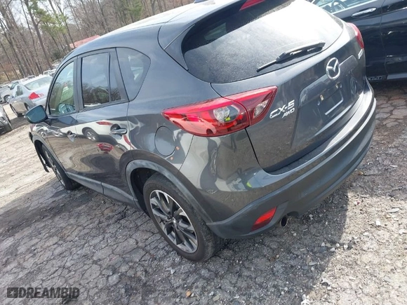 2016 Mazda CX-5 Grand Touring with VIN JM3KE4DY5G0836891, listed as a IAAI auction lot 41441065 with NaN miles. Bid and sale history available at carsss.com. Image 3.