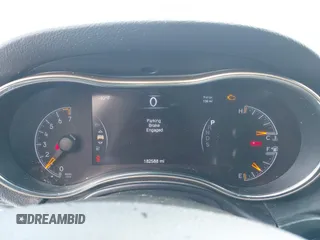 2015 Jeep Grand Cherokee Altitude with VIN 1C4RJEAGXFC856684, listed as a IAAI auction lot 41670546 with 182,588 mi miles. Bid and sale history available at carsss.com. Image 7.