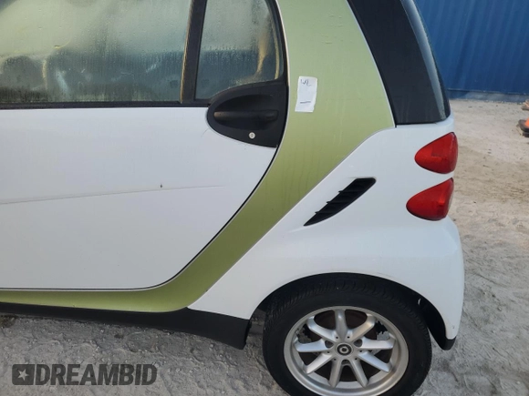 2010 Smart fortwo Pure with VIN WMEEJ3BA6AK358740, listed as a Copart auction lot 76438034 with Not provided miles and Non repairable. Bid and sale history available at DreamBid. Image 12.