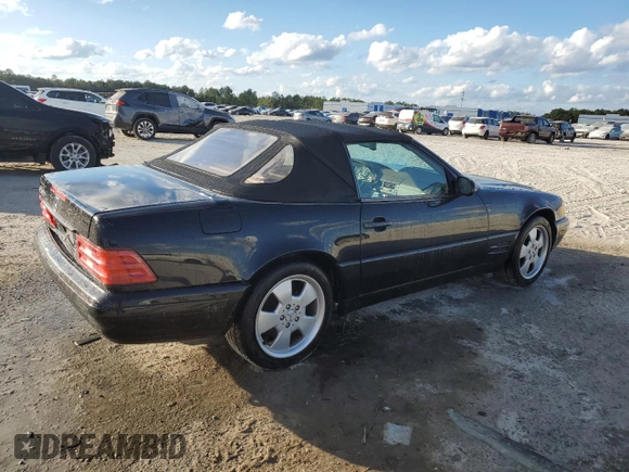 1999 Mercedes-Benz SL-Class with VIN WDBFA68F0XF186163, listed as a Copart auction lot 82669544 with 184,054 mi miles and Salvage Title. Bid and sale history available at carsss.com. Image 3.